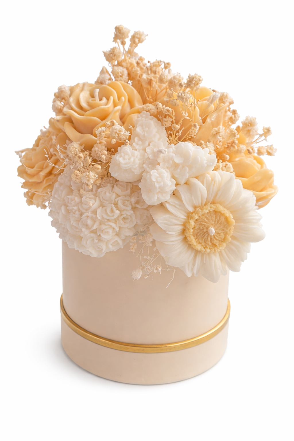 Decorative flower arrangement in a beige container with a gold rim on a white background