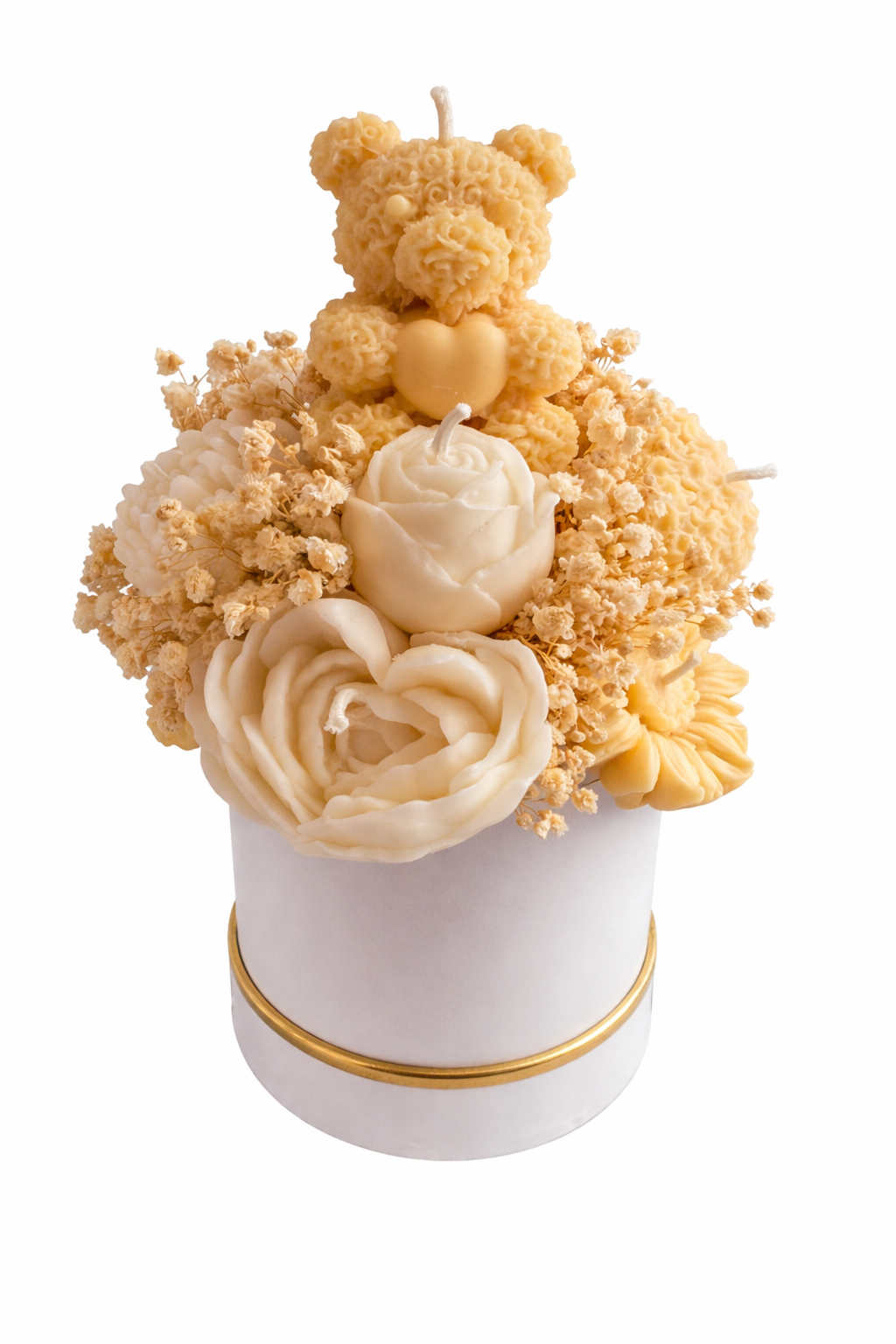 Candle shaped like a teddy bear with floral elements on a white background