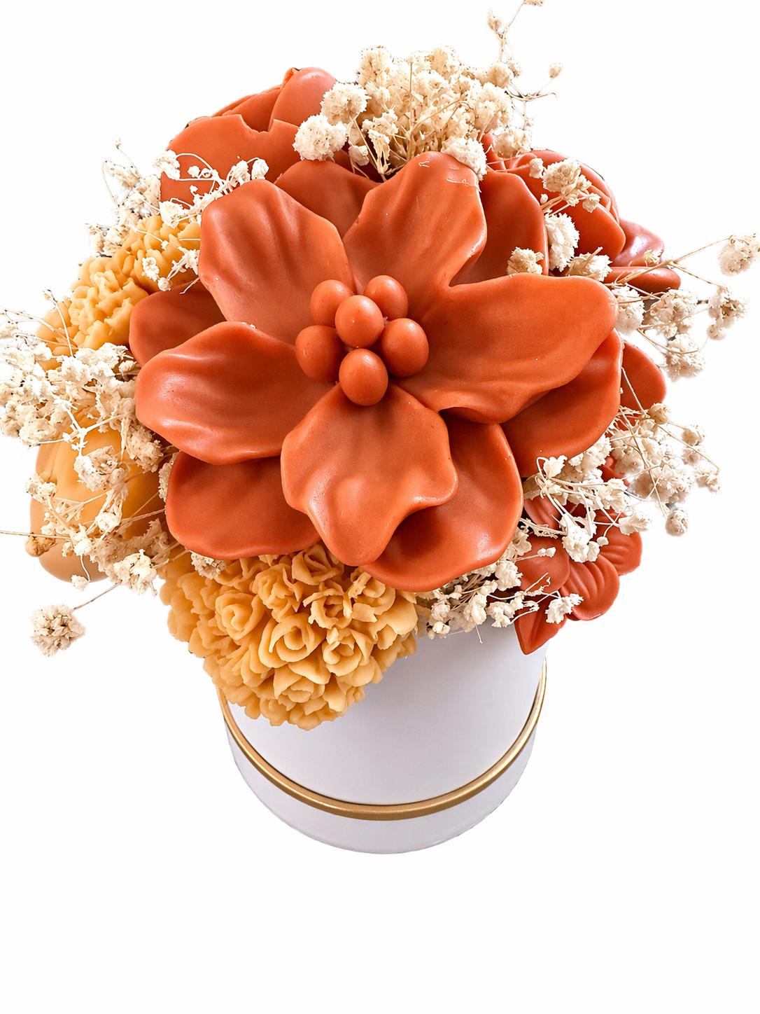 Handcrafted floral candle bouquet featuring terracotta and golden wax flowers with a butterfly accent in a white container with gold trim.