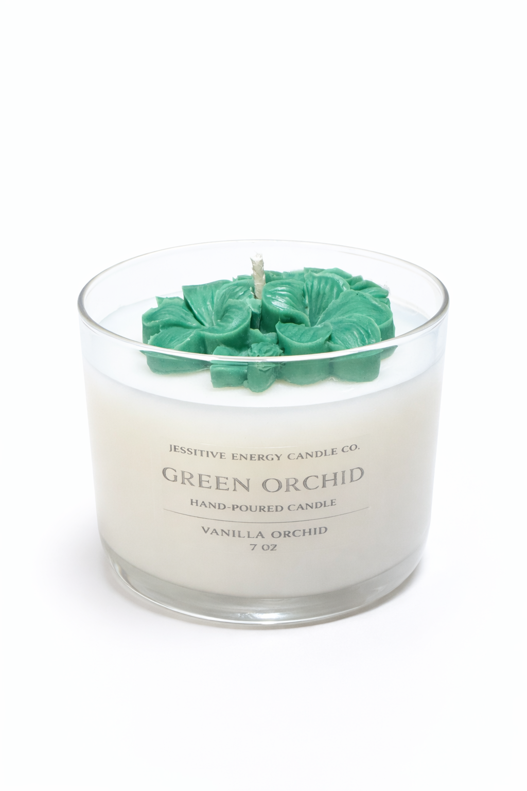 Candle with green orchid design on a white background